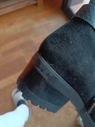Botines negros con hebilla y cremallera