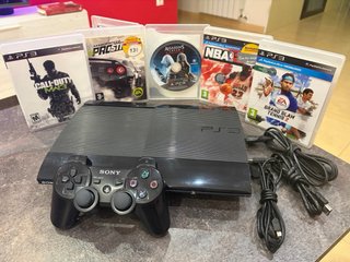 PlayStation 3 (PS3) Slim con giochi + accessori