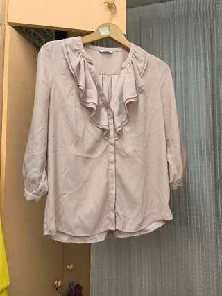 Blusa rosa con volantes