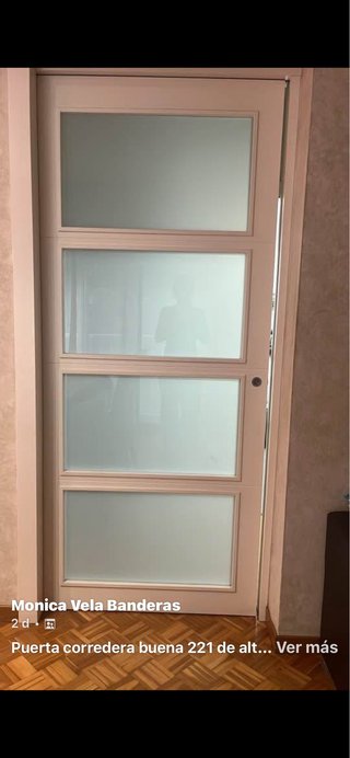 Puerta corredera con cristal