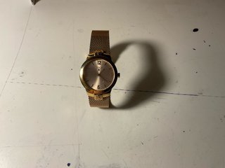 Reloj Tous Dorado y tomi hilfiger