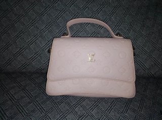 Bolso de mano Louis Vuitton blanco y dorado