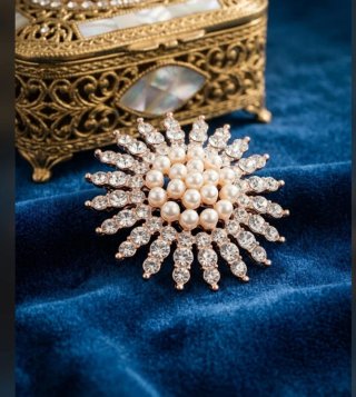 Broche Sol Perlas