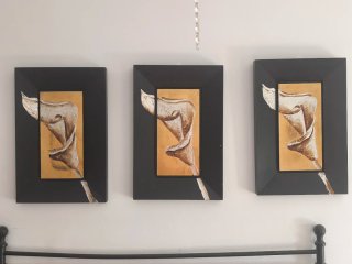 Tríptico de cuadros modernos negro y dorado