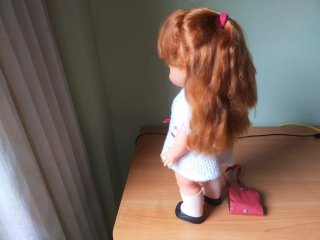 Muñeca antigua pelirroja