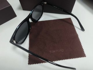 Gafas de sol Tom Ford negras y doradas