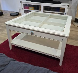 Mesa de centro blanca con cristal