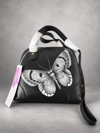 Bolso Anna by Anuschka con diseño de mariposa