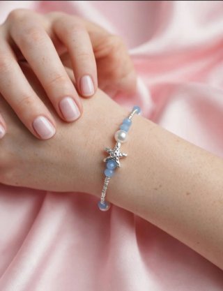 Pulsera de Acero con Estrella y Cuentas