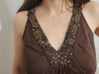 Blusa sin mangas con pedrería talla M