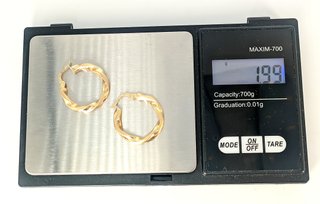 Aretes de oro de 18k, 1.99 g.