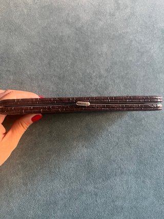 Monedero marrón trenzado