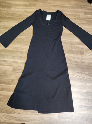Vestido largo de punto con abertura lateral