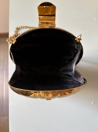 Bolso fiesta dorado redondo