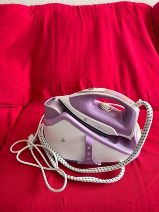 Plancha de ropa a vapor