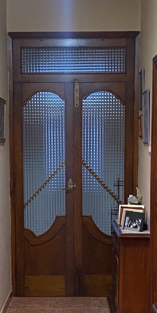 Puerta doble madera y cristal