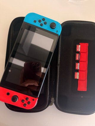 Nintendo Switch + Juegos