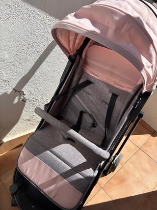 Carro de bebé rosa y gris