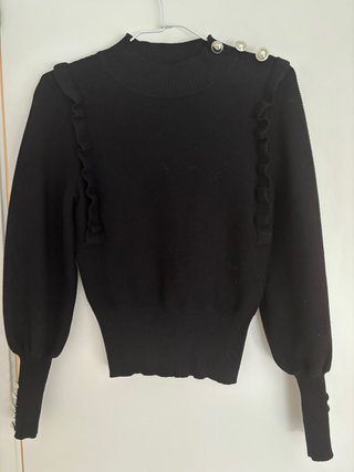 Jersey Morgan negro con volantes y botones
