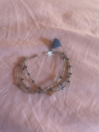 Pulsera multicapa con abalorios y corazón