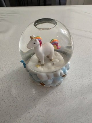 Palla di vetro con unicorno