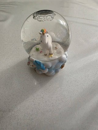 Palla di vetro con unicorno