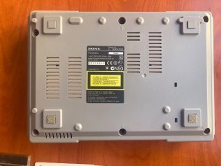 Consola PlayStation 1 (SCPH-7002) con juegos