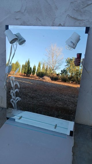 Espejo de baño con repisa y luces