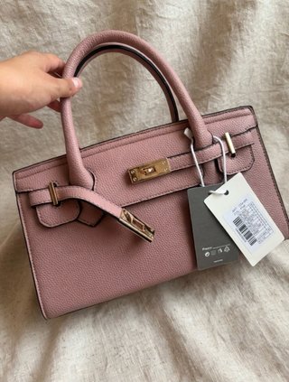 Bolso rosa tipo Birkin