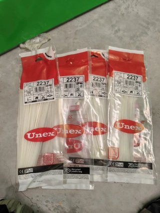 LOTE 4.250 BRIDAS UNEX – MATERIAL PROFESIONAL