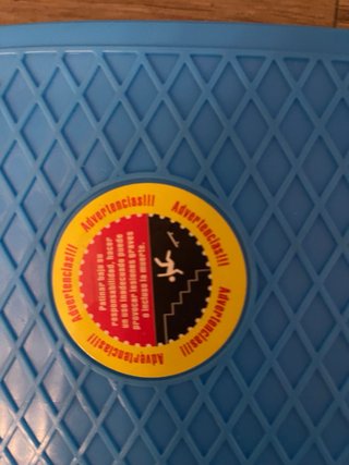 Monopatín tipo Penny azul y naranja