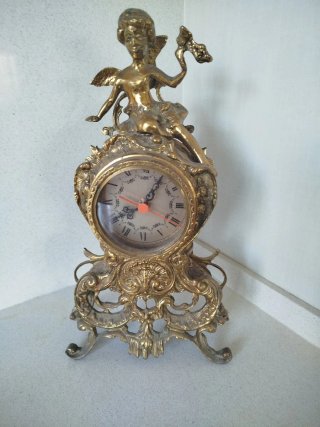 Antiguo Reloj de Bronce con Figura