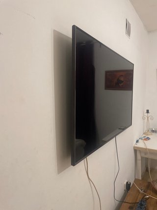 Smart TV 49 sin mando ni pie