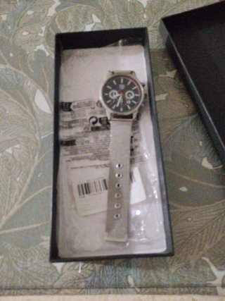 Reloj con correa metálica
