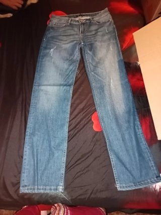 Pantalones vaqueros desgastados mujer