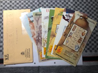 Lote 23 Dípticos y 87 Sellos Correos España (1987)