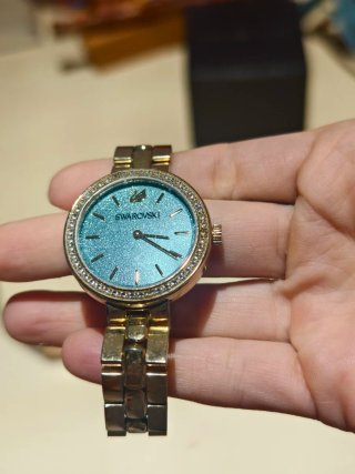 Reloj Swarovski Dorado y Turquesa