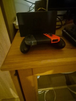 Nintendo Switch Negra y Naranja