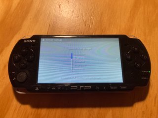 Sony PSP 3004 Piano Black + 5 giochi