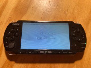 Sony PSP 3004 Piano Black + 5 giochi