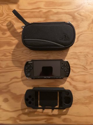 Sony PSP 3004 Piano Black + 5 giochi