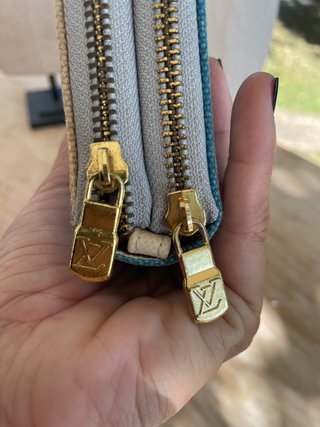 Cartera Louis Vuitton con ciudades