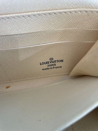 Cartera Louis Vuitton con ciudades