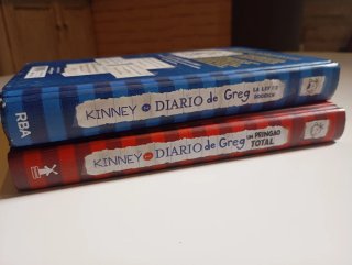 Libros el diario de Greg números 1 y 2.