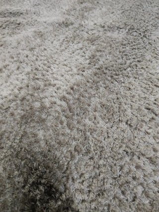 Alfombra de pelo largo beige