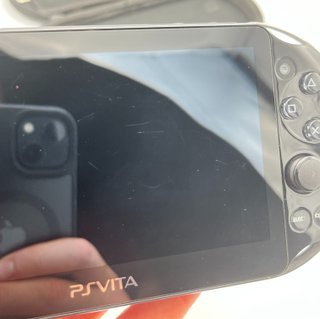 Sony PS Vita PCH-2004 Nera + Caricatore + Custodia
