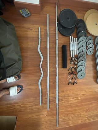 Conjunto de Barras y Discos de Pesas