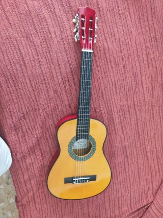 Guitarra española Infantil + funda protección.