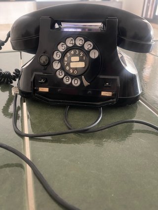 Teléfono antiguo baquelita negro