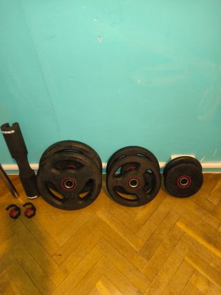 BARRA DE MUSCULACION CON PESAS